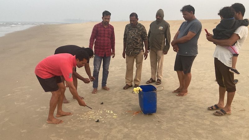 Fishermen worship the first hatchlings of the 2023 season with Forest Department officials, 10 February 2023
